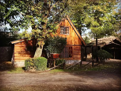 Hotel Los Plátanos Cabañas & Suites